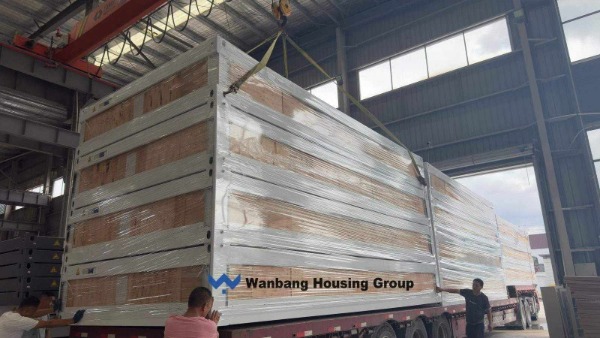 Flat-pack container house loaded into 40HQ shipping container &mdash; Wanbang
